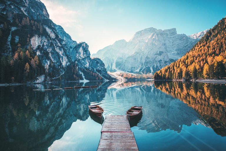 Boats on Lake Braies Dolomites mountains