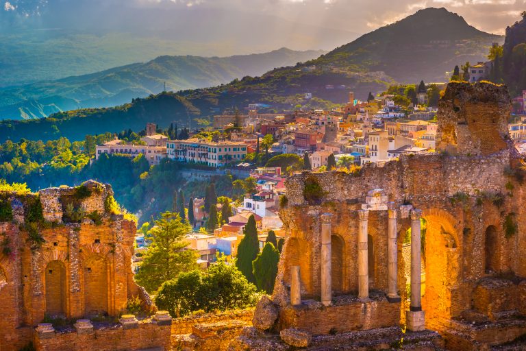 The ruins of the Taormina Theater at sunset.