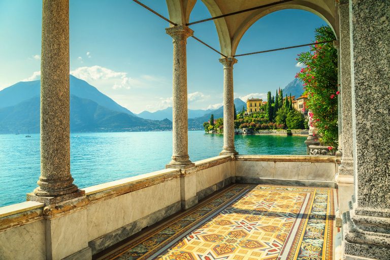Gorgeous balcony of a fabulous mediterranean luxury villa with decorated floor and breathtaking view from the villa Monastero, lake Como, Varenna, Italy, Europe